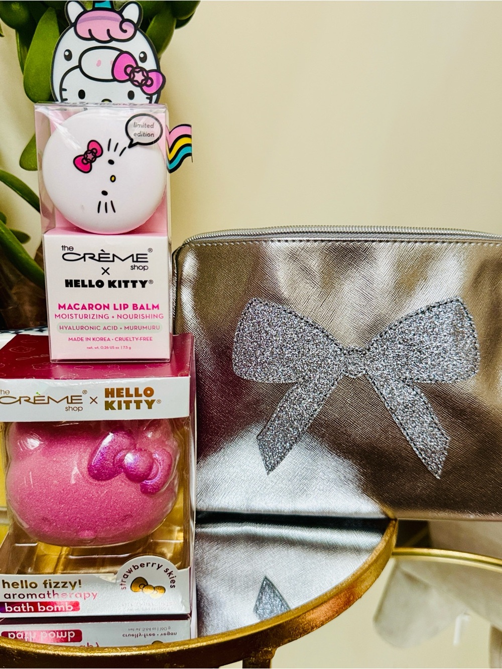 Hello Kitty Pink Macaron Lip Balm Hello Kitty Bath Bomb in Bow Cosmetic Bag